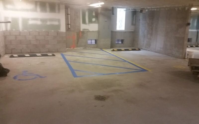 A room with some blue lines on the floor