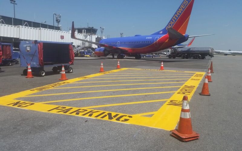 A southwest airplane parked at an airport.