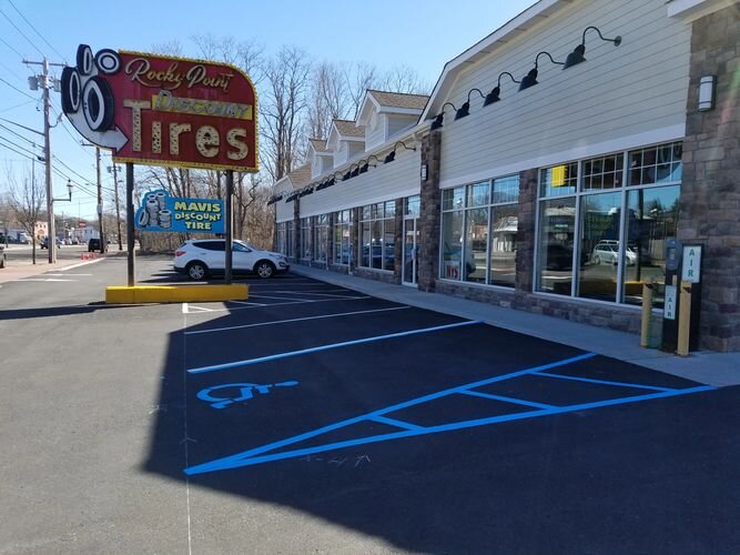 A parking lot with cars parked in it.