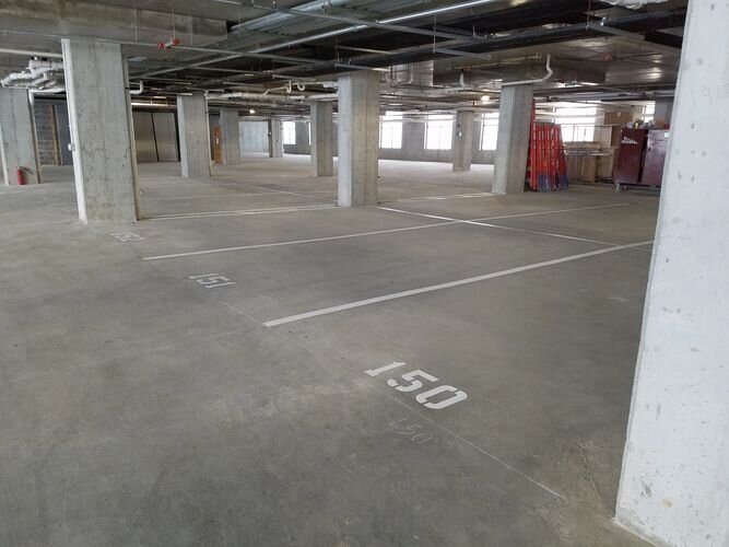 A parking garage with no one in it.