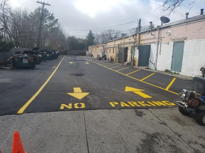 A parking lot with no parking and no parking signs.